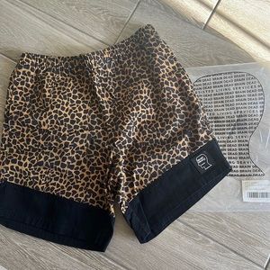 Brain Dead paneled leopard shorts